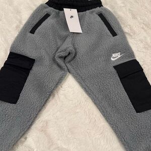 NWT Nike club fleece joggers with cargo pockets gray with black details size XS